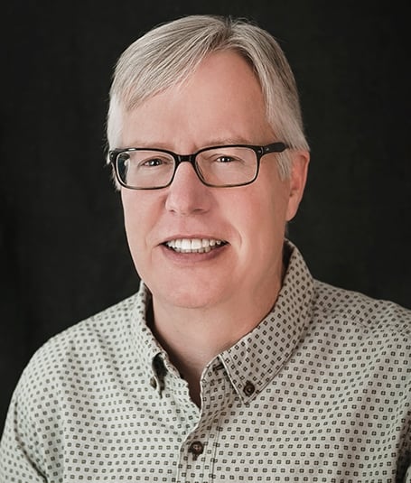 Hans J. Sieber smiling at the camera