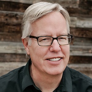 Hans J. Sieber smiling at the camera